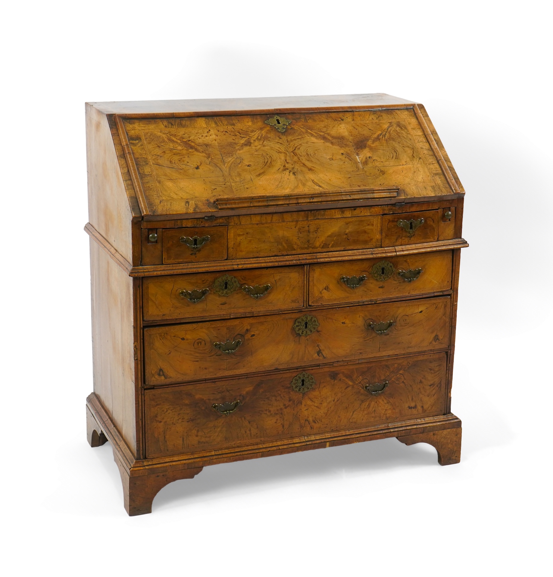 A George I feather banded walnut bureau